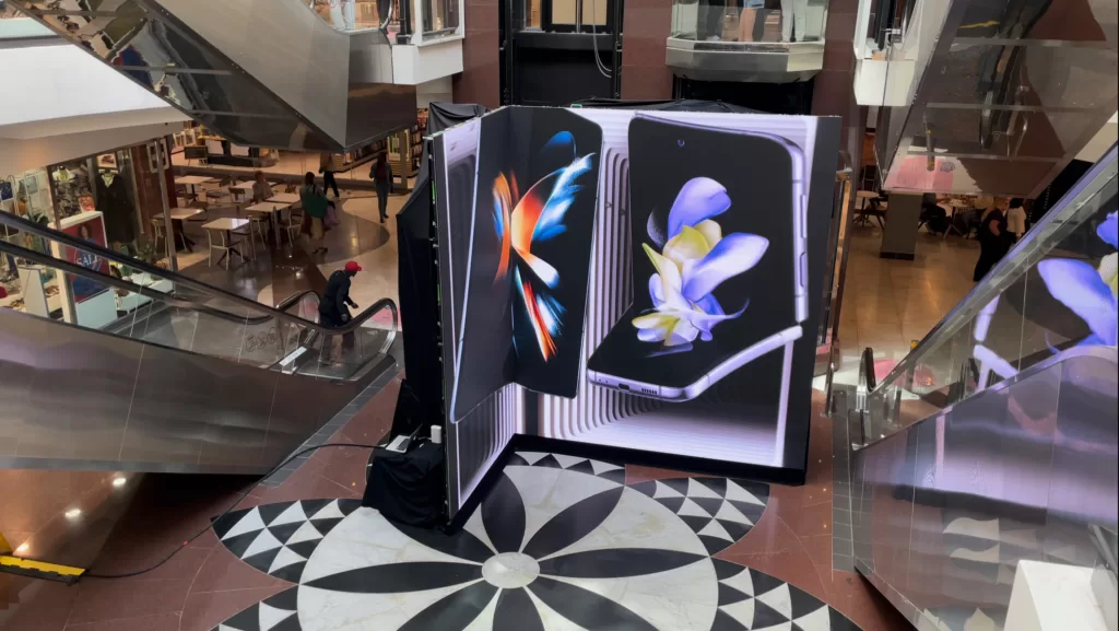 4m x 6m LED screen rental towering over center court in popular Cape Town mall